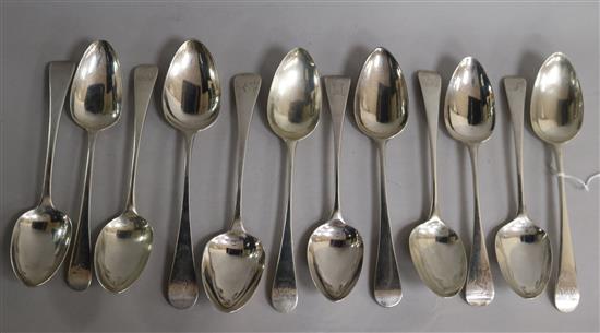 A harlequin set of twelve George III silver Old English pattern tablespoons, 23.5 oz.